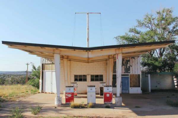Old gas station with a butterfly-style roof