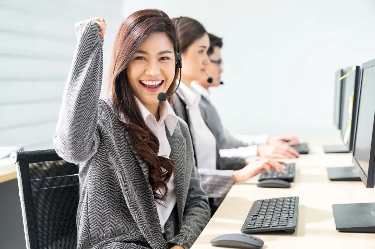 Female tech support agent smiling