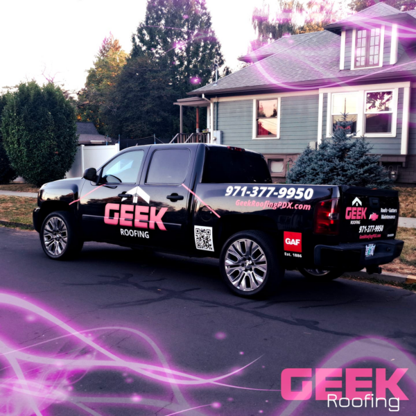 Black and pink roofing truck wrap