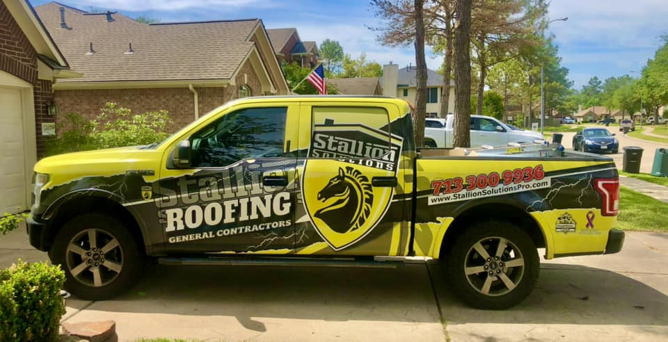 Full yellow and black roofing truck wrap